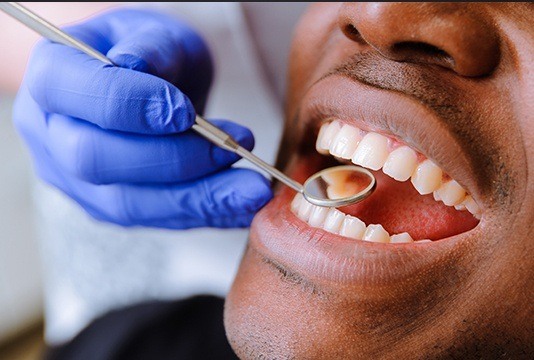 Man receiving dental treatment