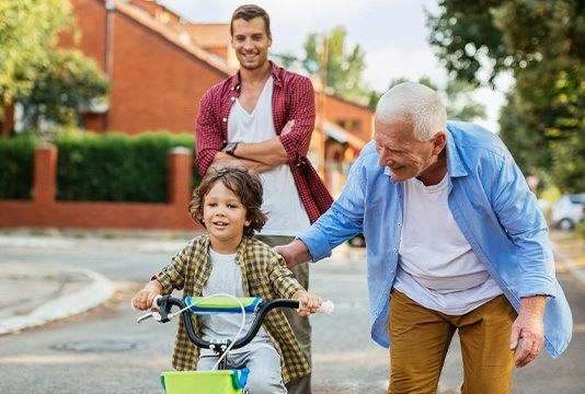 Father son and grandson outside together