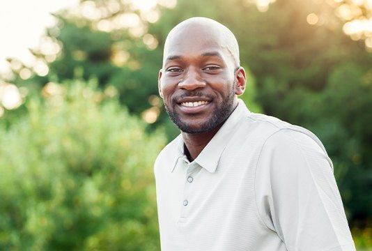 Smiling man outdoors