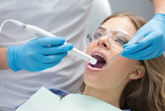 Dentist capturing intraoral images