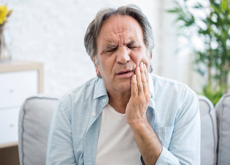 Older man with a toochache